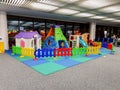 Kids play ground in Don Mueang airport terminal, Bangkok. For passengers traveling with Royalty Free Stock Photo