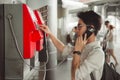 BANGKOK, THAILAND - JANUARY 22: A man make a call at station n Royalty Free Stock Photo