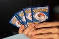 A man playing Pokemon Trading Card game.