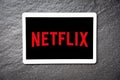 Netflix app on Tablet service watching entertainment and movies with Netflix logo