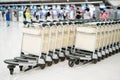 BANGKOK, THAILAND - January 21, 2023: Row of airport luggage carts at Suvarnabhumi International Airport terminal, Bangkok,