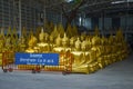 Sculptures of a sitting Buddha. Bangkok, Thailand