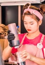 Girl making a chocolate ice cream drink