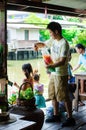 Bangkok, Thailand : Japanese tourists are feeding fish