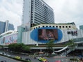 An advertisement shows up on a large outdoor screen