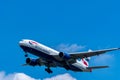 British Airways commercial airline. Passenger plane landing at Suvarnabhumi Airport with blue sky. Arrival flight. Vacation time.