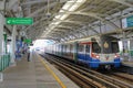 Bangkok,thailand-July 25,2015:The Bts train stop and security guard check yellow line before at bts station