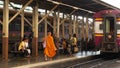 BANGKOK, THAILAND - 11 JULY, 2019: Hua Lamphong railroad station, state railway transport infrastructure SRT. Buddhist holy Monk