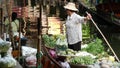 BANGKOK, THAILAND - 13 JULY 2019: Lat Mayom floating market. Traditional classic khlong river canal, local women farmers, long-