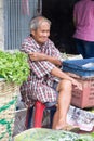 Vegetable vendor at Pak Khlong Talat market