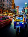 colorful tuk tuk in the city China town with neon lights Royalty Free Stock Photo