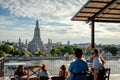 BANGKOK, THAILAND - July 29, 2019: Unidentified Enjoy eating at the bar restaurant beside Wat Arun Rung or Wat Arun is a beautiful