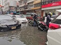 Bangkok, Thailand - Jun 8, 2019 : Car traffic on the flooded street during heavy rain at Bangkok