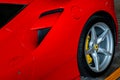 Close-up of Rear wheel, and Rim of Red metallic Ferrari car Royalty Free Stock Photo