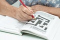 Bangkok, Thailand June 14, 2023 Alzheimer disease AD, Asian elderly woman playing sudoku puzzle game to practice for dementia