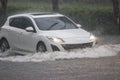 Car driving flood water, it`s raining heavily hard, Some of the flooded