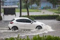 Car driving flood water, it`s raining heavily hard, Some of the flooded area is flooded