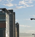 BANGKOK, THAILAND - JUNE 5, 2017: Condominium buildings and street light poles