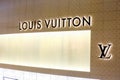 Bangkok, Thailand - June 02 2019: LOUIS VUITTION or LV logo on brand of Retail store at EMPORIUM. Night time