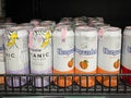 Many cans of beer on the shelf for sale in the Makro supermarket