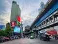 Many car at Asoke intersection with many vehicles in Bangkok Thailand