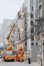 Bangkok, Thailand - June 12,2021: Many worker with fully safety stuff in the basket of mobile elevating truck crane working