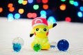 Pikachu Miniature toys with marble and colorful night light bokeh