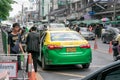 BANGKOK, THAILAND - JUNE 01: Bangkok registered taxi, license plate number 4048 picks up customer at the exit of Sirirat Hospital