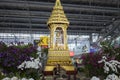 Bangkok, Thailand - June 28, 2015: Small golden shrine at Suvarnabhumi International Airport. Concept of Buddhism, the major relig