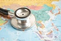 Bangkok, Thailand June 1, 2022, Stethoscope on Asia world globe map background Royalty Free Stock Photo