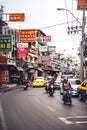 BANGKOK, THAILAND - 10 JUNE, 2015: Traffic in a small street wit Royalty Free Stock Photo