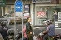 BANGKOK, THAILAND - JUNE 04: Unnamed lone passenger awaits for bus next to a stop on Petchkasem 69 in Bangkok on June 04, 2020 Royalty Free Stock Photo