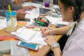 BANGKOK, THAILAND - JUNE 15: Unnamed student does homework and studies for exam in Seacon Square in Bangkok on June 15, 2019