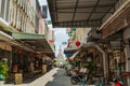 Wat Arun temple and local cafe restaurant street in Bangkok, Thailand Royalty Free Stock Photo