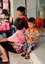 Bangkok, Thailand: Little Boy on Steps