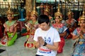 Bangkok, Thailand: Man Praying at Erawan Shrine