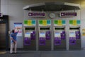 Bangkok, Thailand - 22 01 2019 - man watching metro train schedule near ticket vending machines