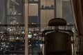Comfort chair in Living room and City view at home, condominium in the evening