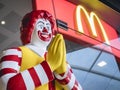 BANGKOK, THAILAND - MAR 14, 2019 : Thai Style Mc Donald Mascot in front of Shop Thailand Ronald McDonald greeting