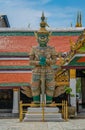 Bangkok, Thailand - Mar 29, 2022:  The Thailand traditional arts of Demon Guardian or Giant guardian at the gate of the temple of Royalty Free Stock Photo