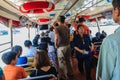 Bangkok, Thailand - March 2, 2017: Cashier of Chao Phraya Express boats is selling tickets and collect money from the passengers.