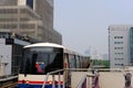 cityscape of modern office building & BTS sky train mass transit