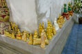 BANGKOK, THAILAND, MARCH 06, 2018: Close up of small golden budhas in the Temple in Bangkok