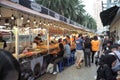 Bangkok, Thailand:March5,2023- Crowded of tourists walk and buy the delicious food in the street food fair