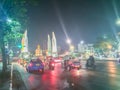 Bangkok, Thailand - March 2, 2017: The democracy monument at night with colorful light and traffic jam. Royalty Free Stock Photo