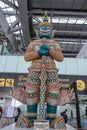 Giant Sculptures greet and welcome visitor in Passenger Terminal at Suvarnabhumi Airport Bangkok in Thailand