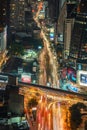 Intersection road in rush hour with motion blur light trails from the fast moving busy transport on highway Royalty Free Stock Photo