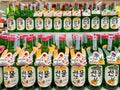 Many bottles of Soju on shelf for sale in the Big-C supermarket