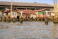 BANGKOK, THAILAND, MARCH, 23, 2018: Outdoor view of floating poor houses with neumatics inside of metallic struture on