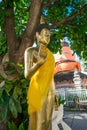 BANGKOK, THAILAND, MARCH 06, 2018: Outdoor view of golden budha statue in a temple Wat Pho, is a royal temple built
